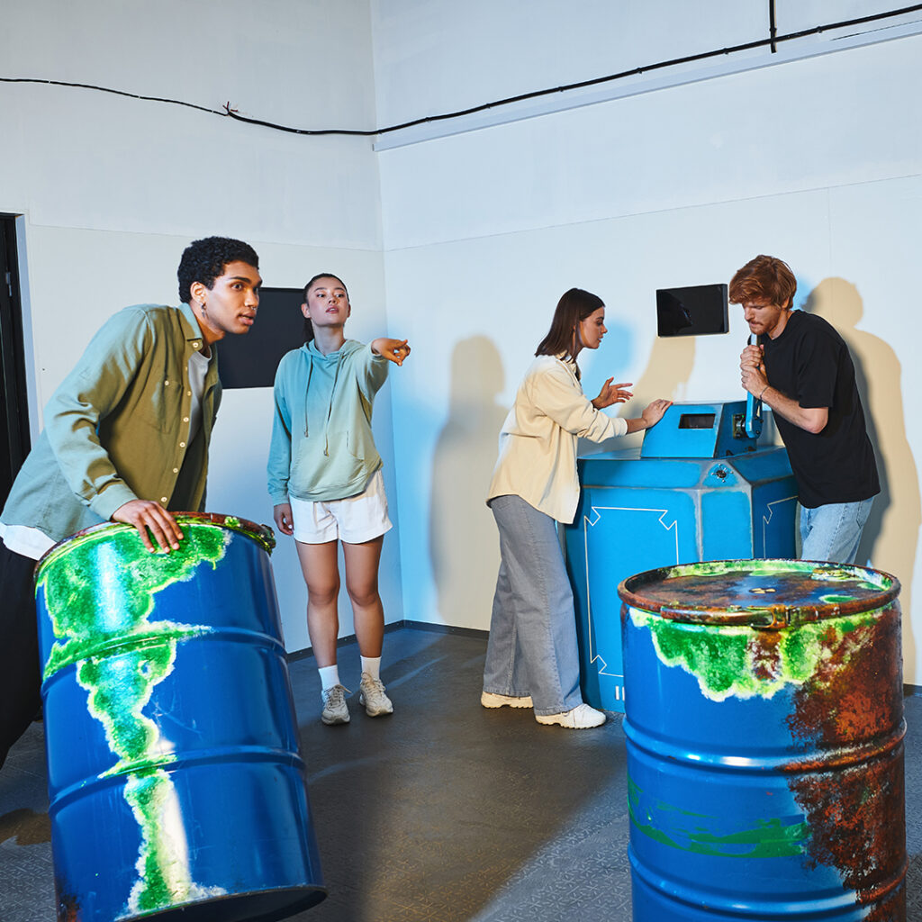 a group of teenagers working together to solve a puzzle