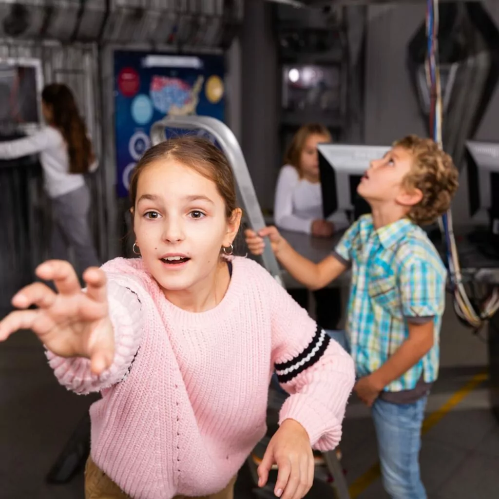 Kids solving escape room challenge